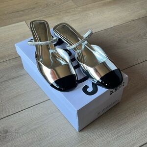 Silver and black Schutz mules